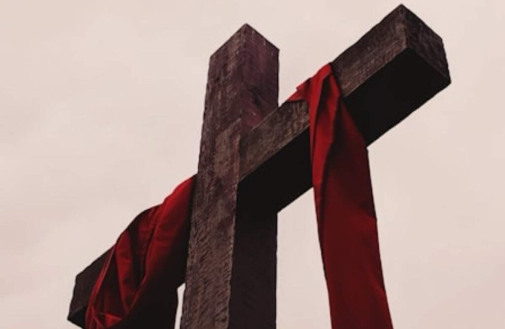 cross with cloth hanging on the cross