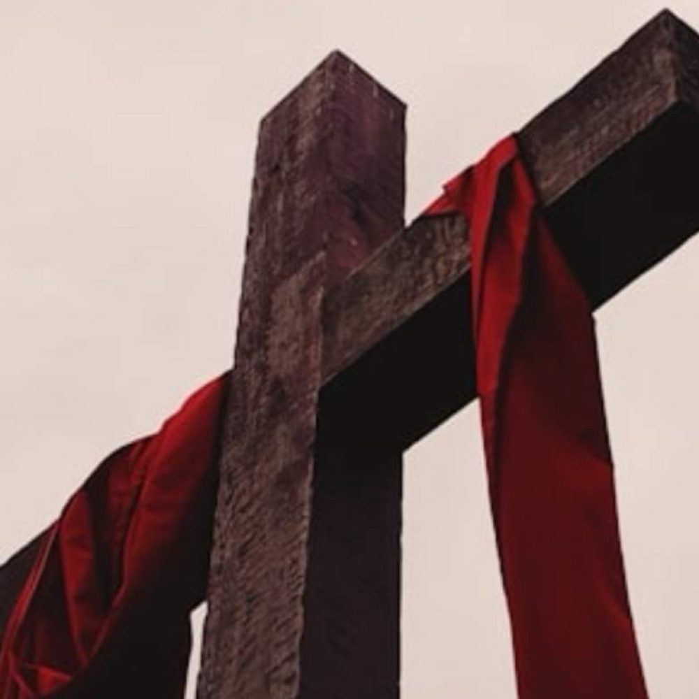 cross with cloth hanging on the cross